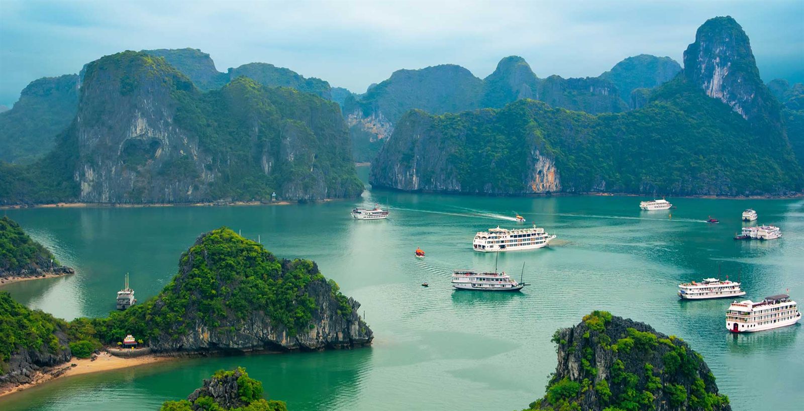 Boats among the islands of Ha Long Bay